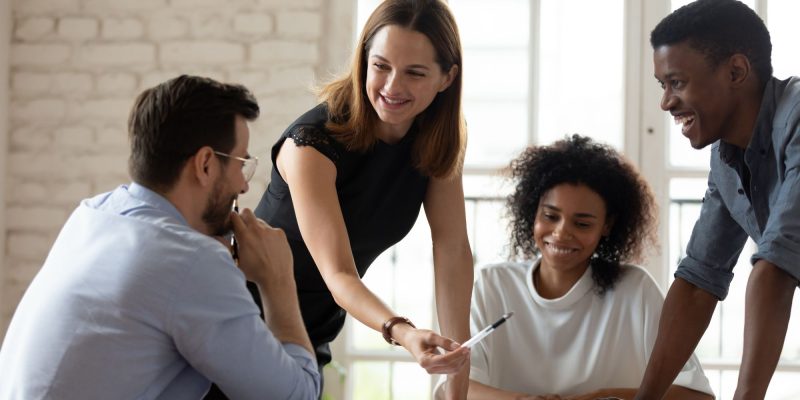 Team collaborating in a modern office setting.
