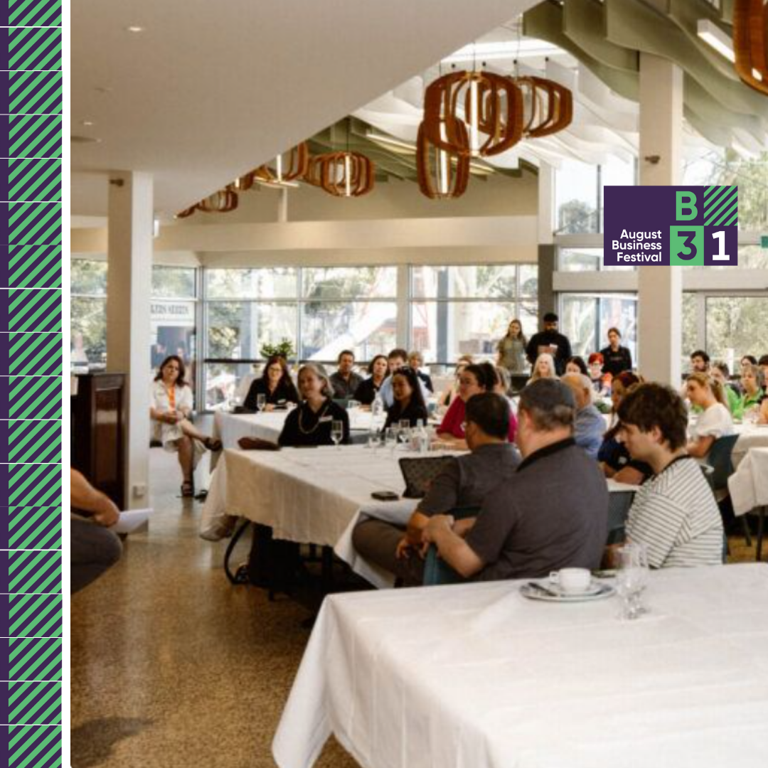 People attending August Business Festival conference.