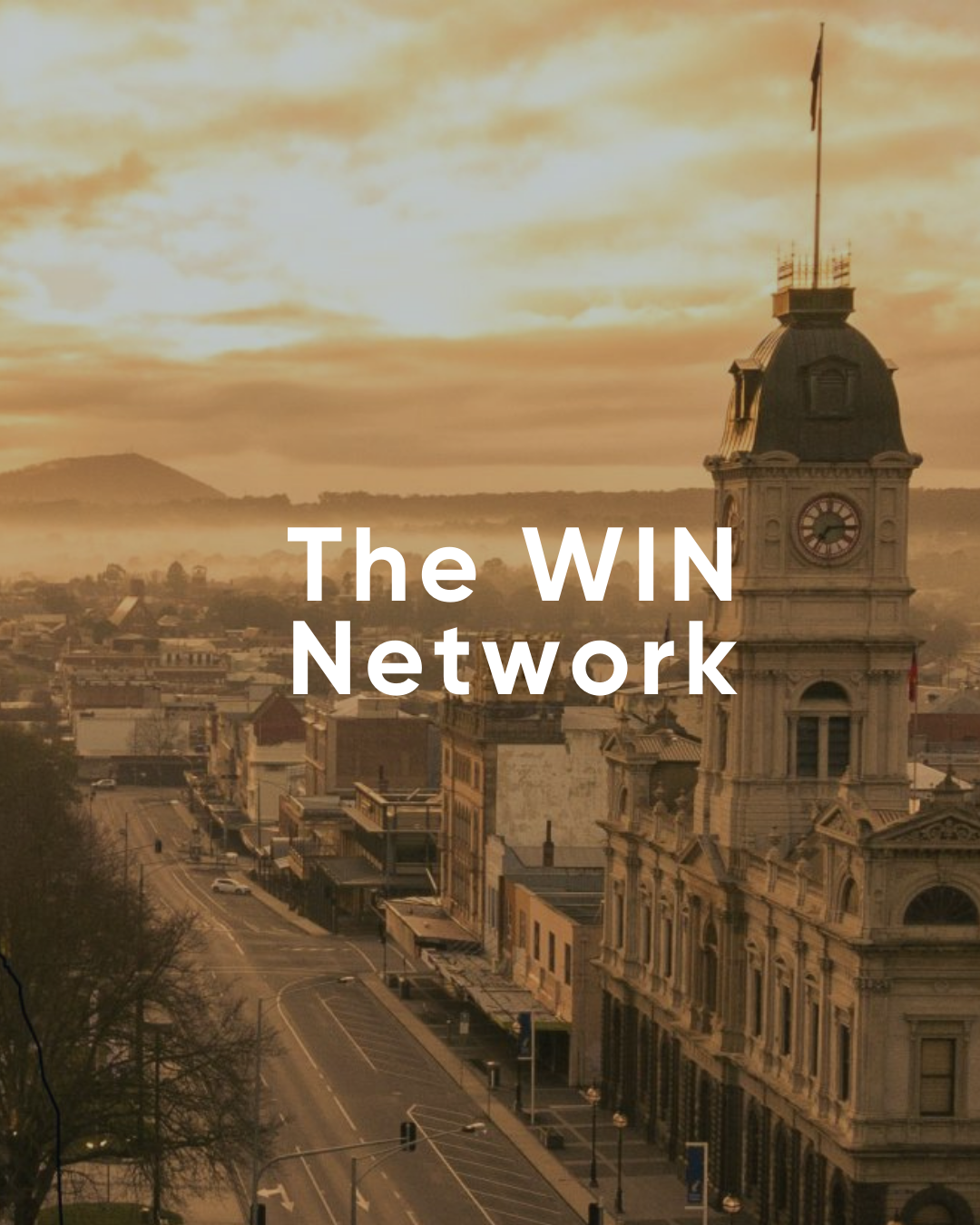 WIN Network logo over a city sunrise