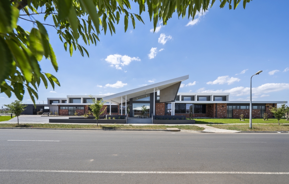 Modern building under clear blue sky in Australia.