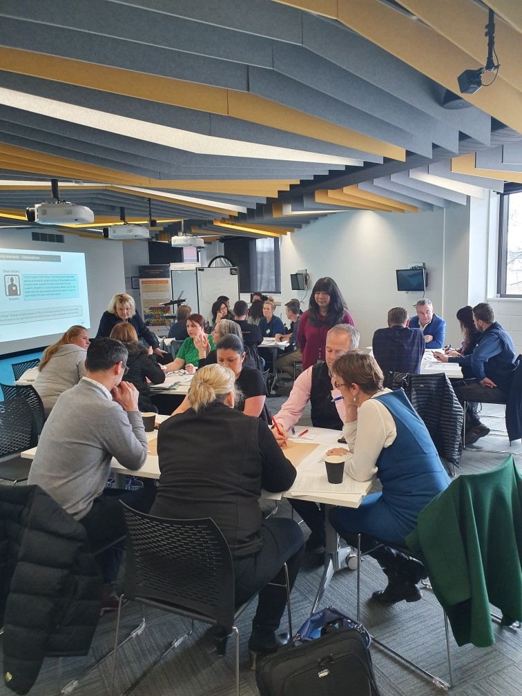 People collaborating in a modern conference room.
